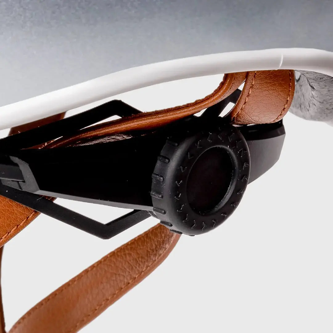 Close-up of the adjustable dial fit system on the Thousand Heritage 1.0 Helmet in So Silver for precise size adjustments.