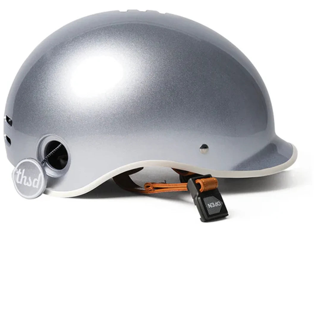 Image of the Thousand Heritage 1.0 Helmet in So Silver with the Secret PopLock shown open.