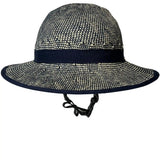 Front view of the Shibori Blue Straw Hat Bike Helmet with navy band and wide brim.