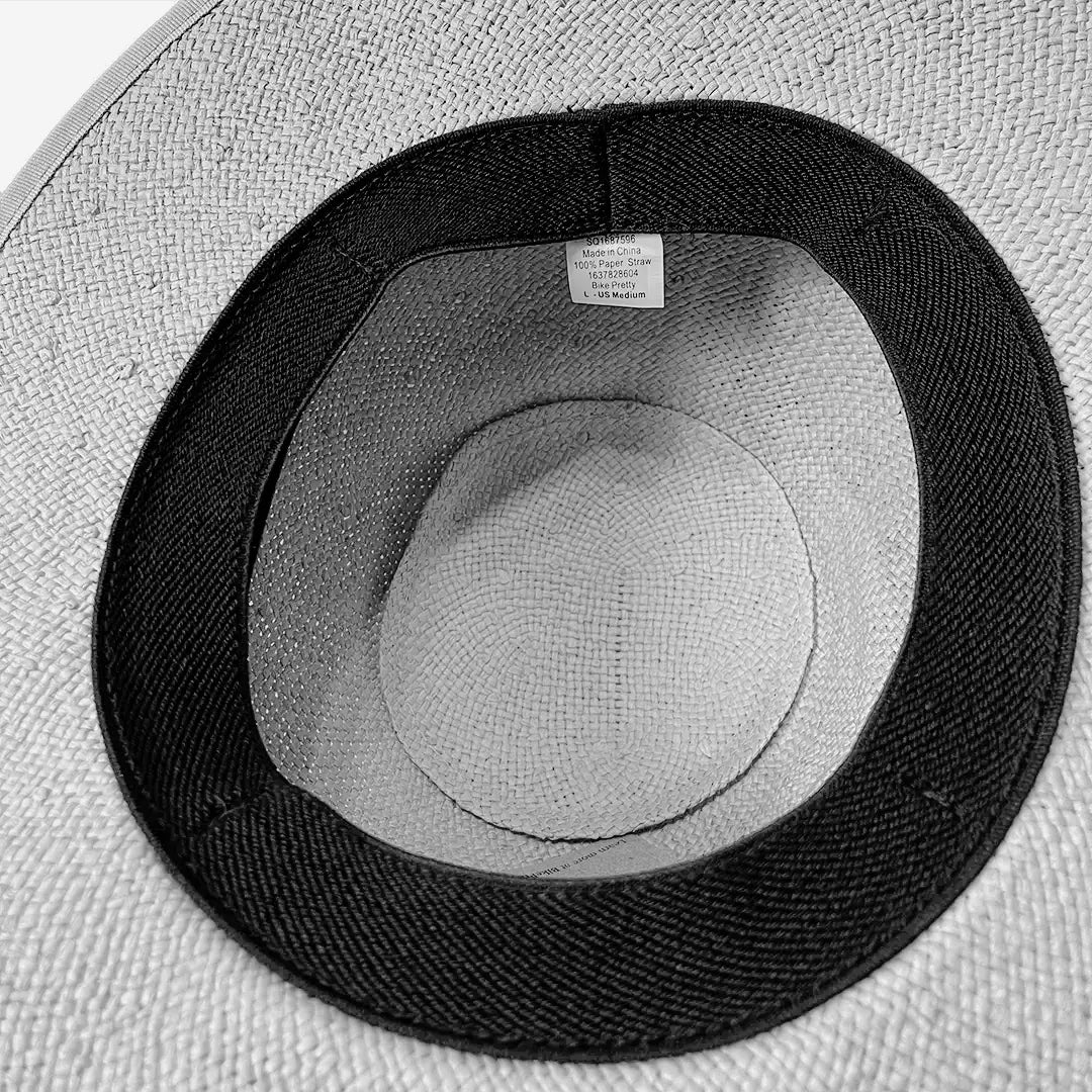 Interior view of Bike Pretty Straw Hat Helmet Cover  – showing elastic cuff lining and Bike Pretty label