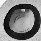 Interior view of Bike Pretty Straw Hat Helmet Cover  – showing elastic cuff lining and Bike Pretty label